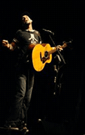 Ari Neufeld gives his all during a performance